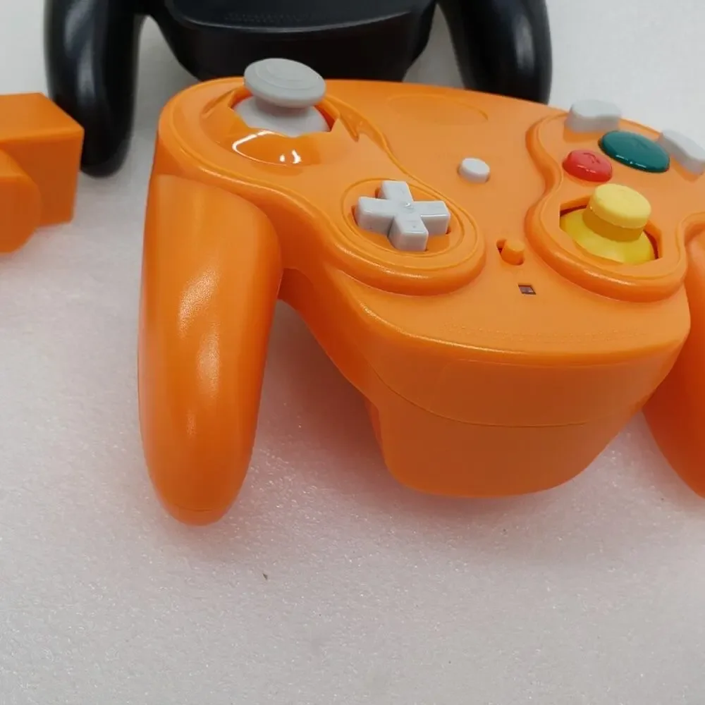 PGFYDAL 2.4G Wireless GameCube Controllers w Wireless Receivers. Orange & Black